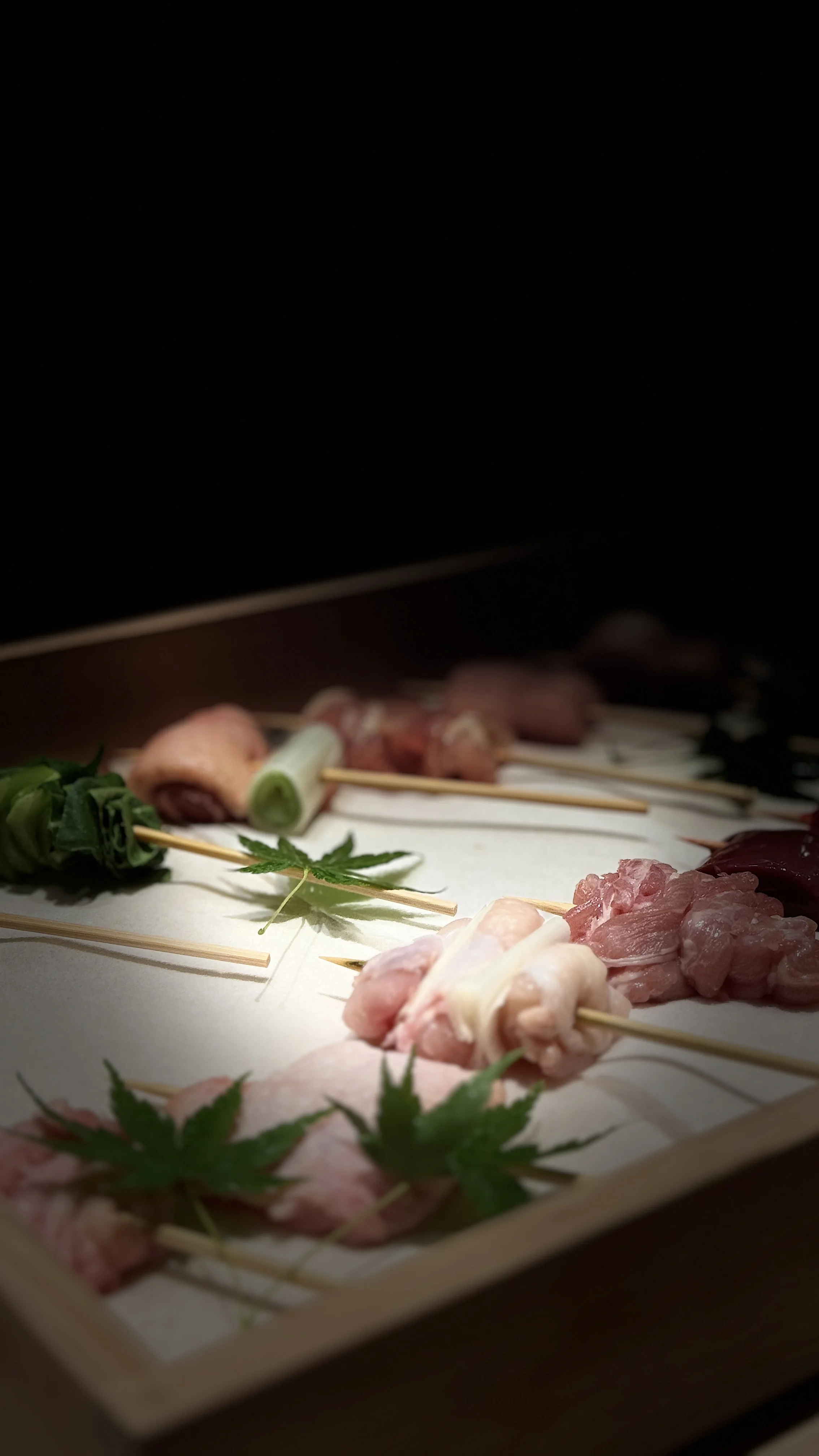Prepared chicken skewers before service