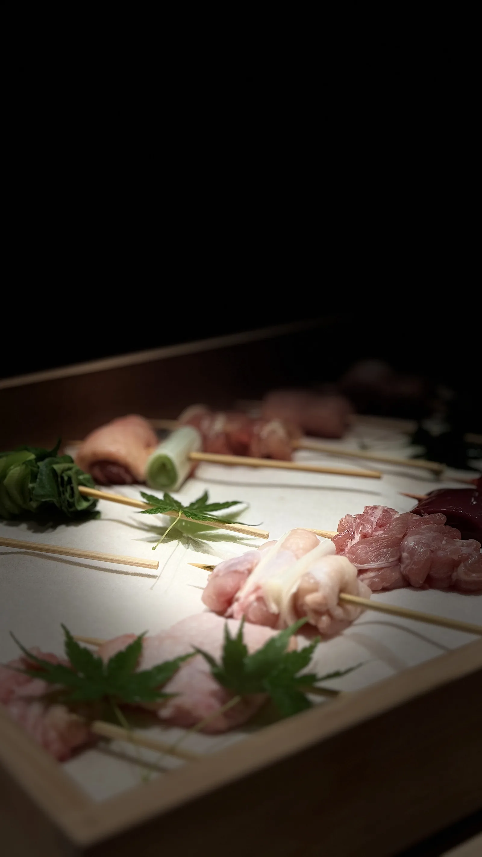 Prepared heritage chicken skewers for yakitori